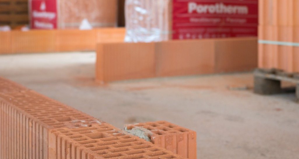 construction site shooting with porotherm bricks and builders family
